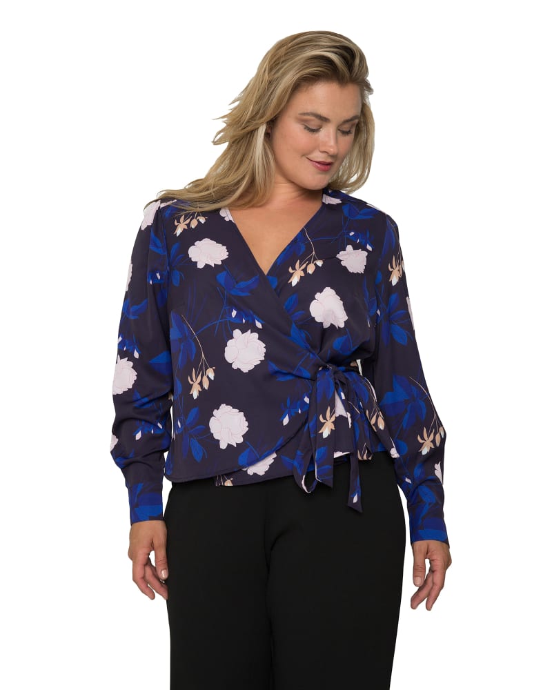 Front of a model wearing a size 1X Tanya Wrap Blouse in MIDBLOOMS by Standards & Practices. | dia_product_style_image_id:276132